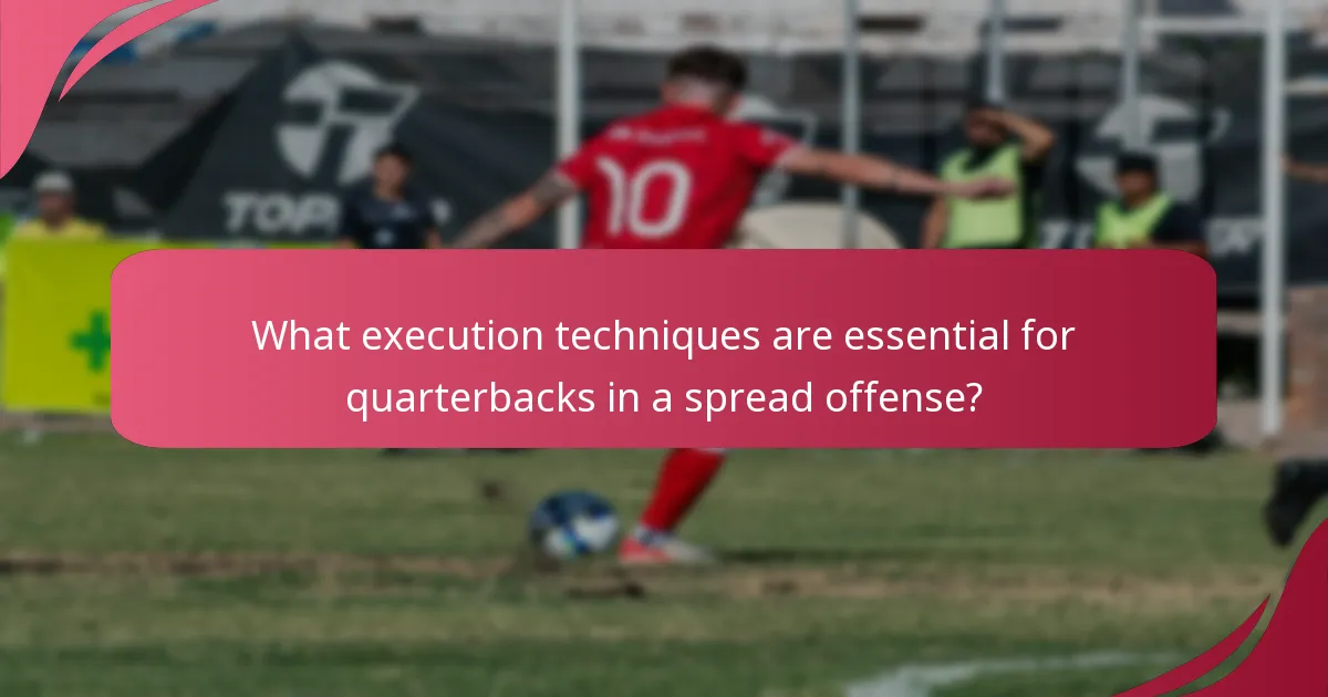 What execution techniques are essential for quarterbacks in a spread offense?
